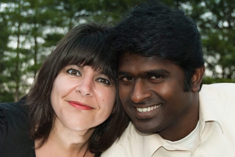 Interracial couple together, illustrating cross-cultural relationships and mutual understanding.